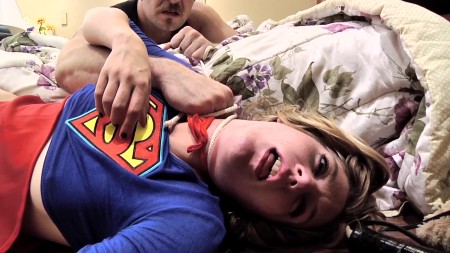 The Fall of Supergirl - Starring Mona Wales and Rock

Supergirl has captured a thug in the middle of breaking into a home. She fights him but he uses his crowbar to beat her down and overpower her. While shes down, he ties her wrists behind her back with a length of rope. Now she is his plaything. The bandit takes her to the bed and pulls out a powerful vibrator, placing firmly over her panties, grinding into her clit. Her cackles turn to moans as she squirms wildly all over the bed. 

Then the bandit takes off her boots and starts to tickle her feet. She laughs hysterically, writhing all over the bed, telling him to stop. But he doesnt, he just keeps tickling her feet, taking off her socks, playing with her toes. Now hes really turned on so he grabs her and shoves his cock in her mouth. He fucks her mouth for a while and then slides into her pussy. The bandit fucks Supergirl all over the room until he cums on her belly.

Now hes fucked all of her powers out of her and shes pissed. She lunges at him, but he throws her back on the bed, grabbing the rope that he used earlier to bind her wrists. He tightens it around her throat. She gasps and kicks, squirming all over the bed, slapping at his arms and trying to pull the rope off, but to no avail. Gradually growing weaker and weaker, she finally stops moving completely. The bandit drags her back up on the bed and leaves her behind.


Fetish Elements:  Explicit Sexual Content, Superheroine, Fighting, Role Play, Bondage, Rope, Costumes, Forced Orgasm, Cumshot, Fucking, Blowjob, 69, Boot Removal, Boot Socks, Strangle, Garrote, Foot Views, Body Views.