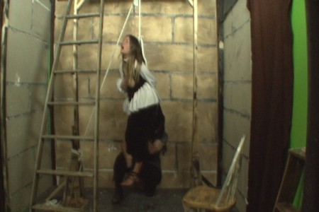 Hang The Witch - Featuring: Tracy C. Lixx

The young witch waits alone in her cell for the hangman.  She confessed to being witch, but they decided to have her hanged anyway.  She struggles against her chains to free herself, but they will not budge.  The hangman enters, and she tries to fight him, but he still drags her to the gallows.  She mounts the ladder and the noose is placed around her neck.  The hangman grabs her feet and turns her off the ladder.  The noose tightens around her pretty little neck and her top falls down revealing her perfect breasts.  She slowly strangles with her breasts shaking as she twitches.

Features: topless nudity, full suspension hanging, strangling, bondage, posing, sandal and foot shots.